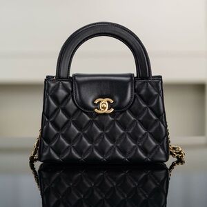 Chanel Black Quilted Mini Bag with Gold Accents